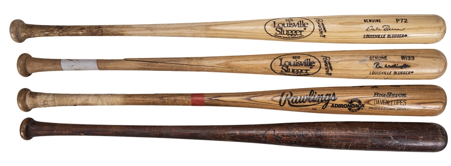 Lot of (4) 1980s Houston Astros Game Used and Signed Bats Including Dale Berra, Ron Washington, Craig Reynolds, and Davey Lopes (PSA/DNA & JSA Auction LOA)